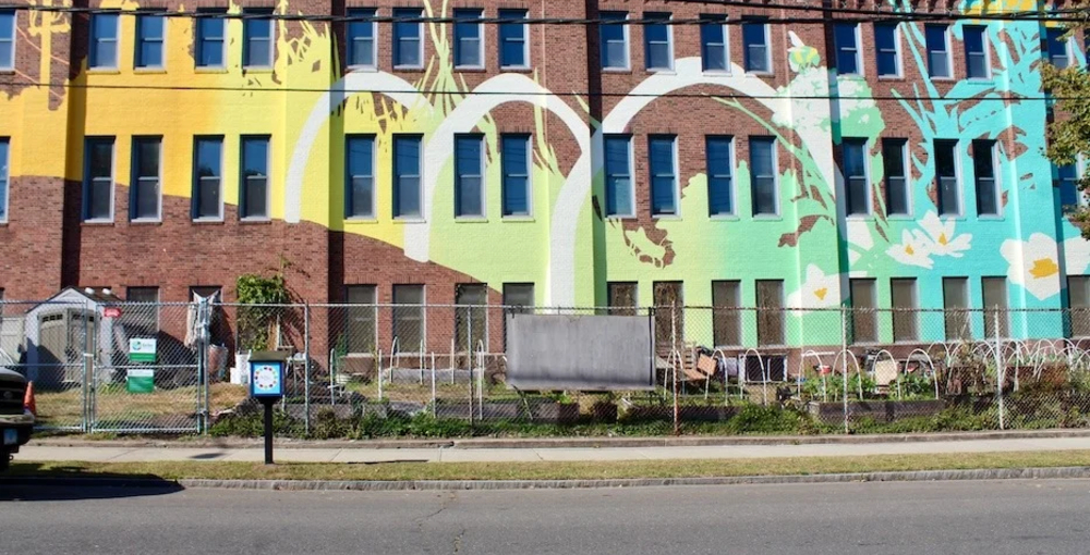 "Thermal Reflections" mural at Goffe Street Armory by artist Michael DeAngelo